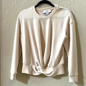 Cream colored gathered front sweatshirt